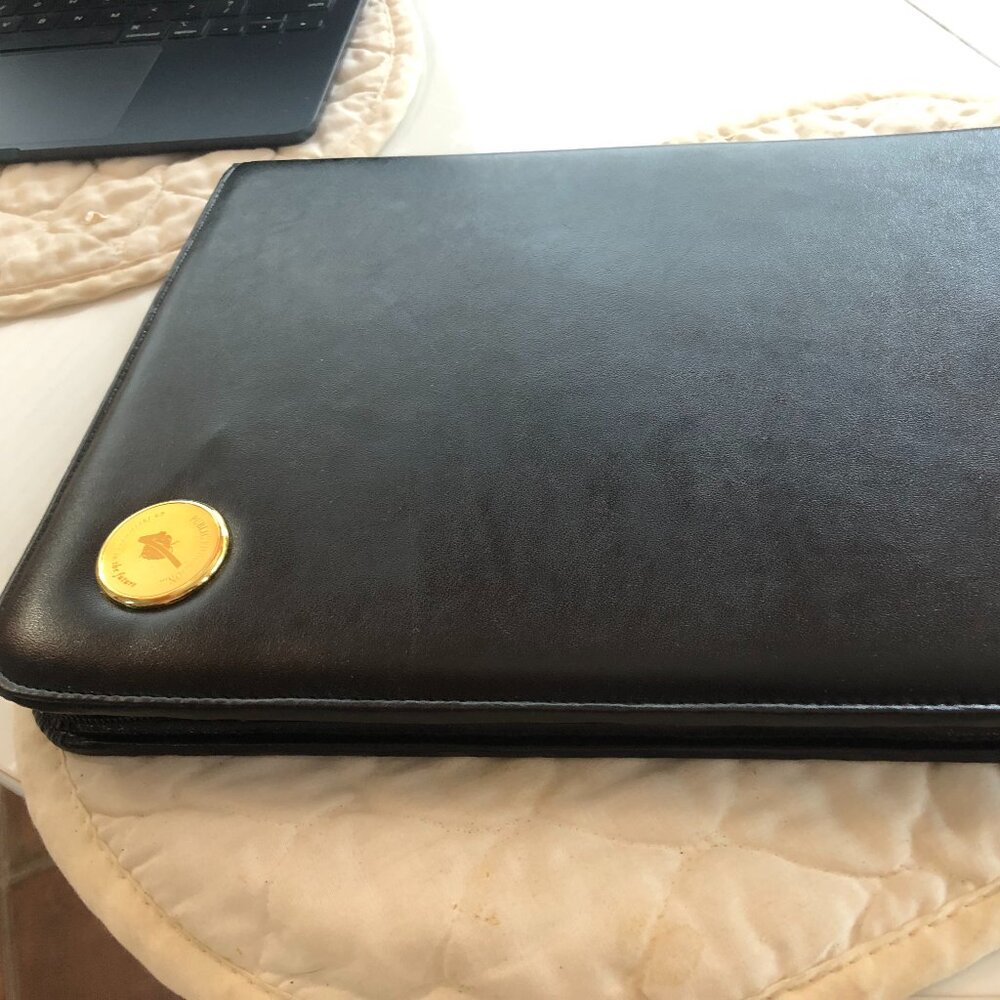 Black leather portfolio with zipper closure in original box